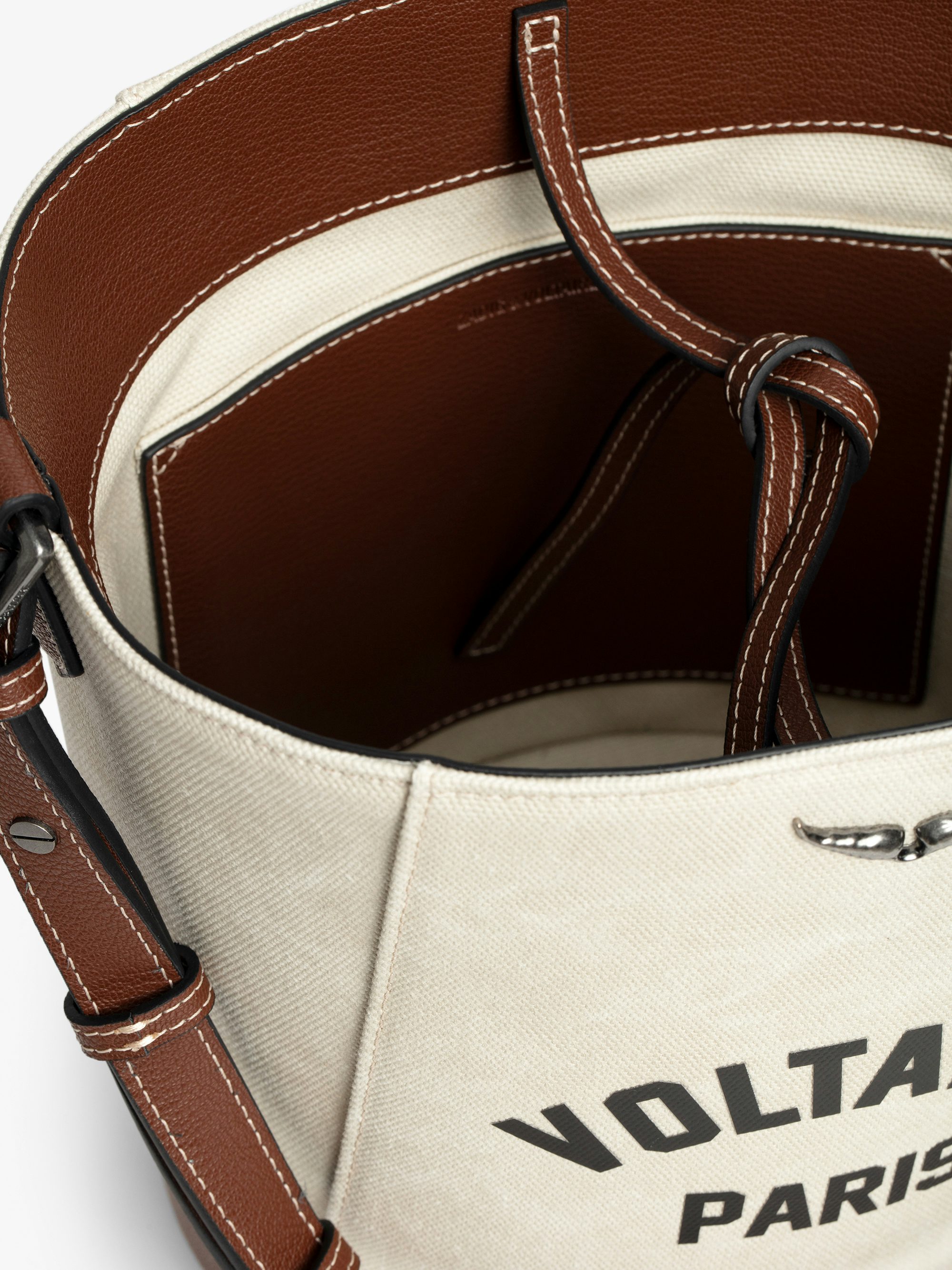 Z Bucket Voltaire Bag - Canvas and grained leather bucket bag with adjustable strap and wing signature.